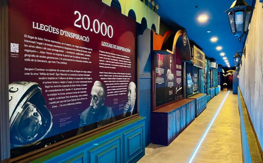 Room 08, 20,000 Leagues of Inspiration — a long illuminated corridor styled as a 19th-century street, lined with panels on Verne's influence